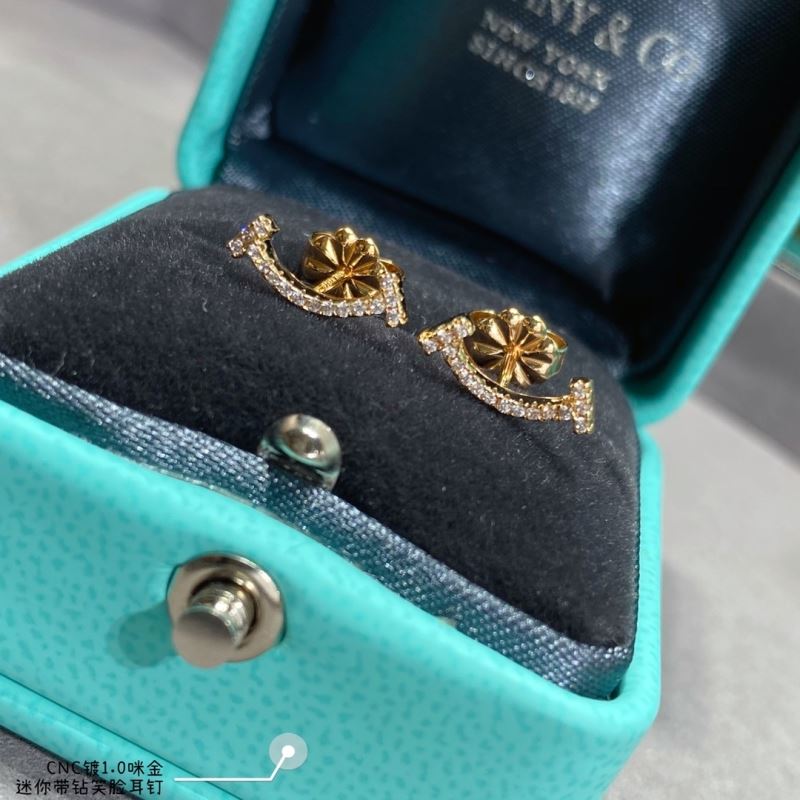 T*f*ny earrings